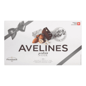 Boîte de pralines Avelines Noir. Décoré avec des morceaux de chocolat, des noix, un ruban en haut à gauche, étiquette "Premium Swiss Chocolate" incluse.
