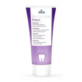 A tube of tooth paste with a purple flower on it.