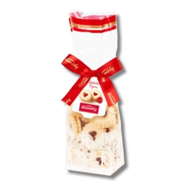 A bag of cookies with a red ribbon.