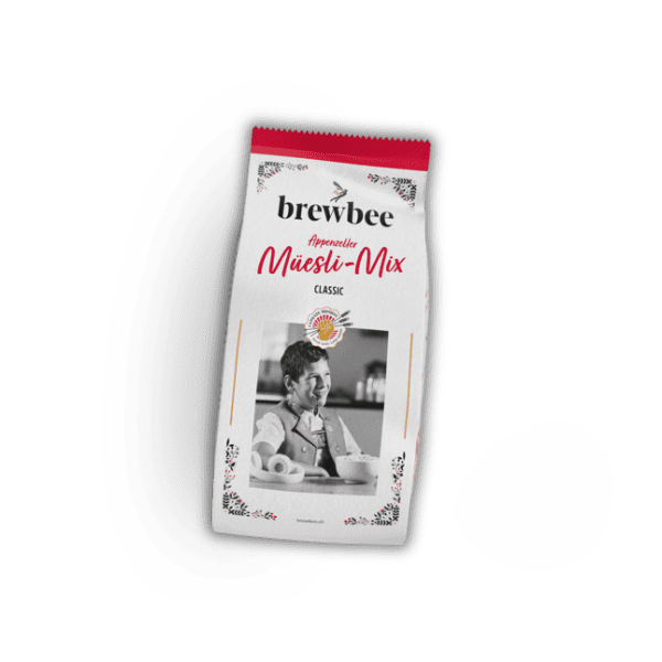 A bag of Muesli Mix Classic | Brewbee with a woman's face on it.