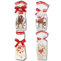 Four bags of Kambly Christmas Biscuits with red ribbons on Kambly Christmas Biscuits.