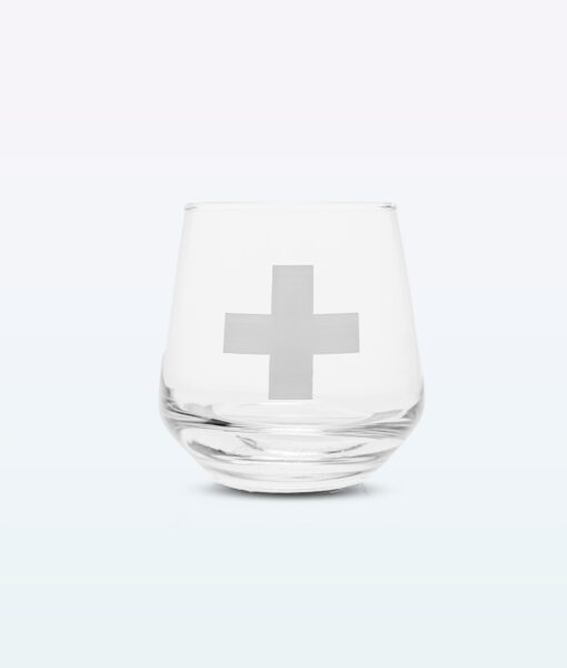 A Swiss Cross Glass 320 ml I Lakeside Valley Distillery with a silver cross on it.