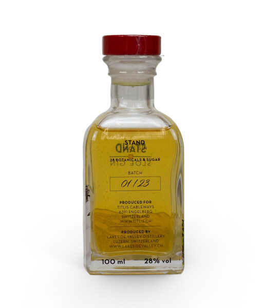 A bottle of olive oil on a white background.