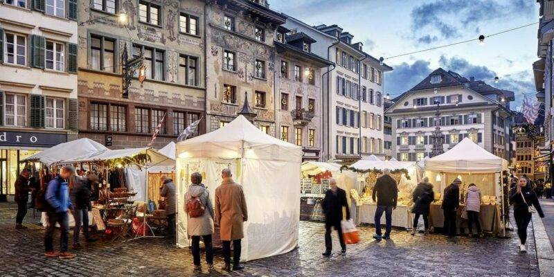 Discover the captivating holiday vibe at Lucerne's popular Swiss Christmas market.