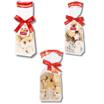 Three bags of Kambly Christmas Cookies with bows on them.