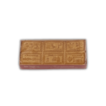 A brown box with the Traditional Biscuits 140 g │Suter Tirggel design on it.